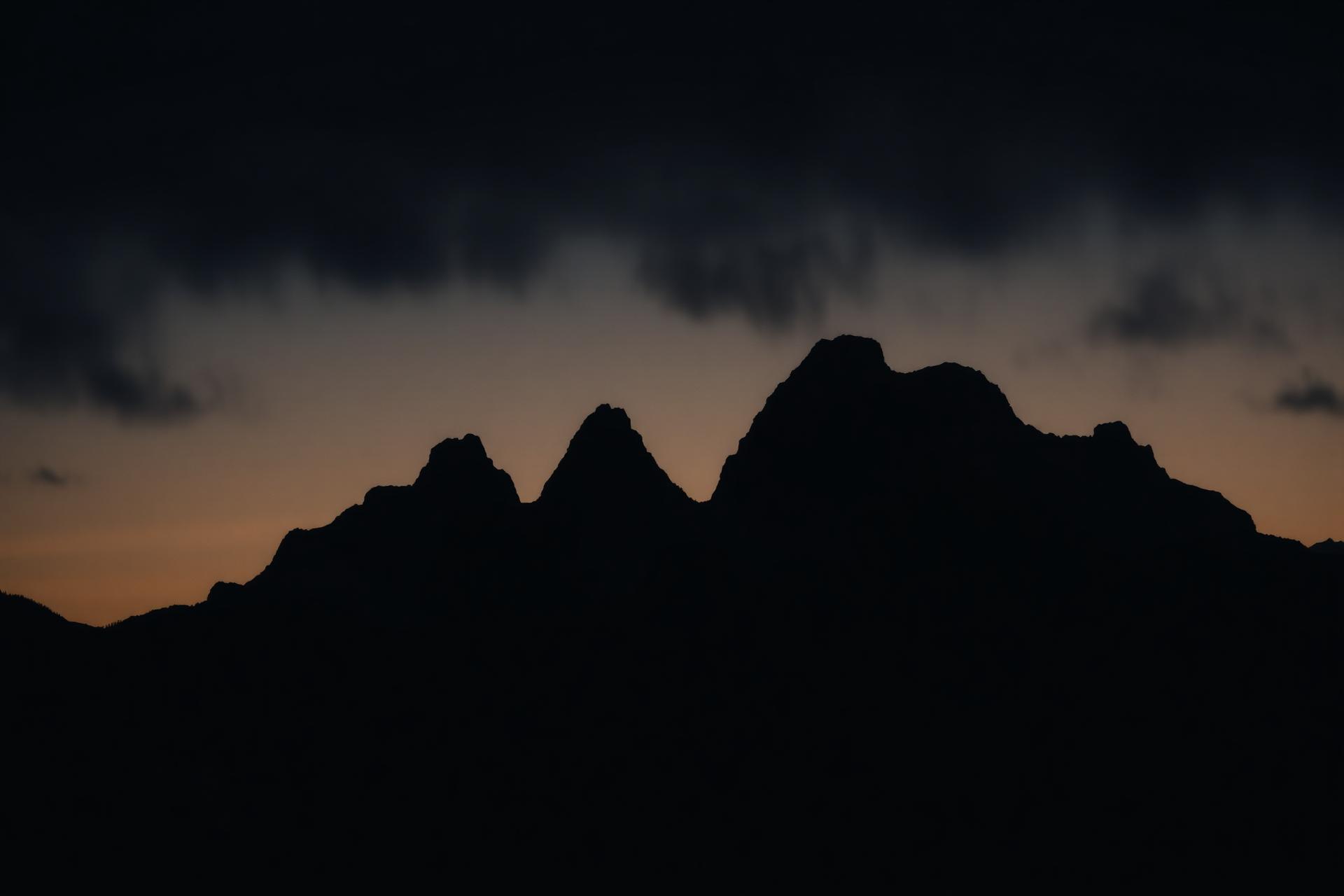Teton mountain range silhouette at dusk